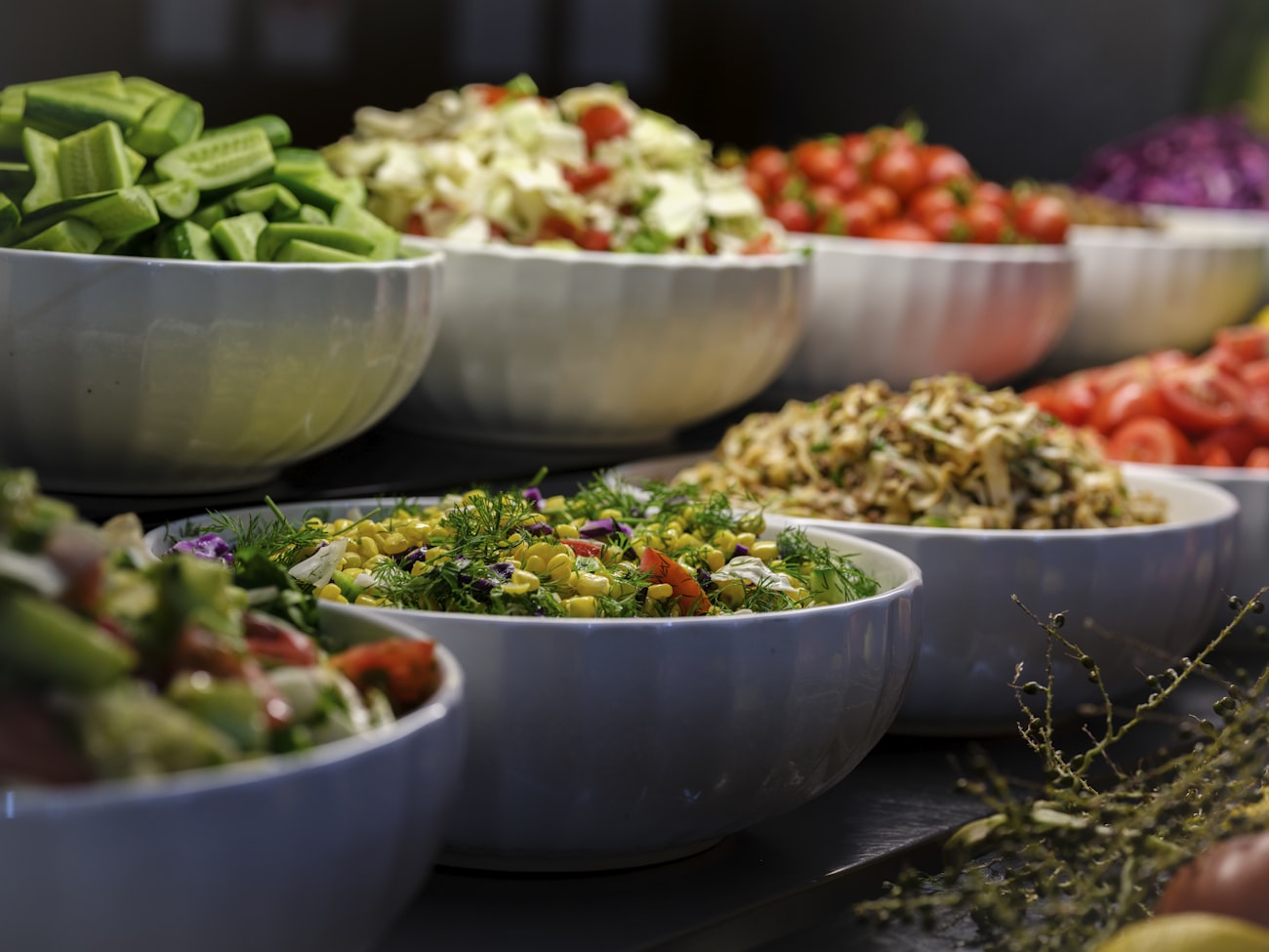 A fresh catered lunch spread in serving bowls